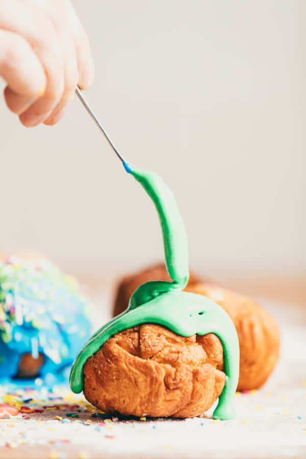 Single Yellow Daffodil Flower Against A Solid Color Background Wallpaper