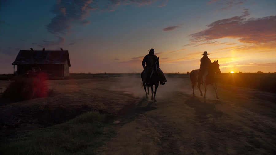 Sinners Riding At Sunset Wallpaper