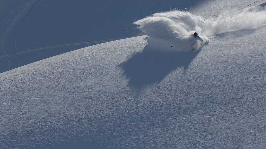 Skiing Ice Surge Wallpaper