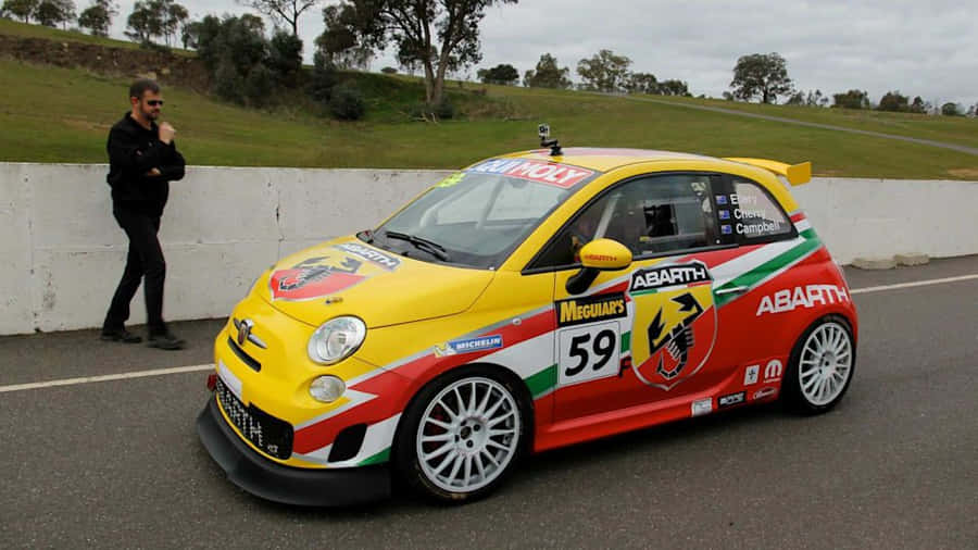 Sleek Abarth 695 In Bold Red Wallpaper