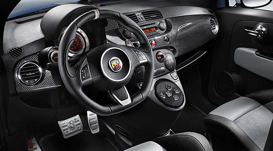 Sleek Abarth 695 Showcasing Its Dynamic Design Wallpaper