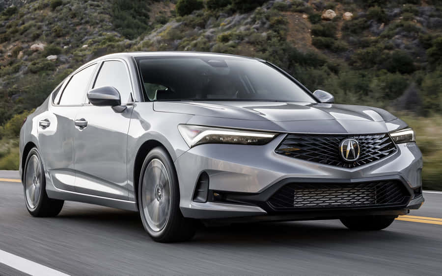 Sleek Acura Integra In A Stunning Outdoor Setting Wallpaper