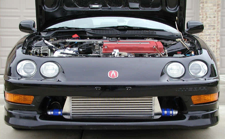 Sleek Acura Integra In Action Wallpaper