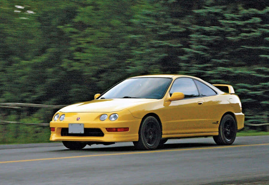 Sleek Acura Integra On The Road Wallpaper