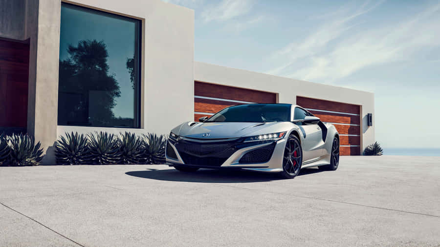 Sleek Acura Nsx In Motion Wallpaper