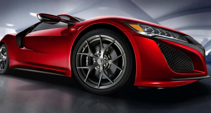 Sleek Acura Nsx Sports Car In Motion Wallpaper