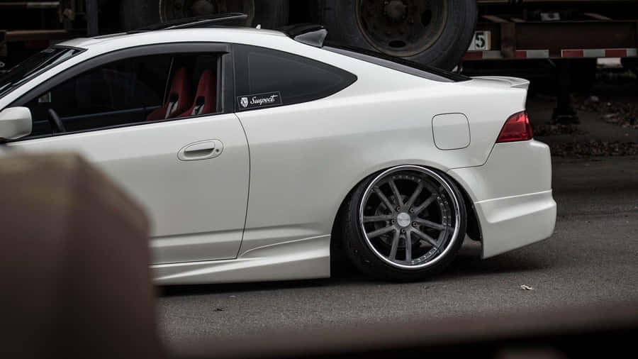 Sleek Acura Rsx Type-s On The Road Wallpaper