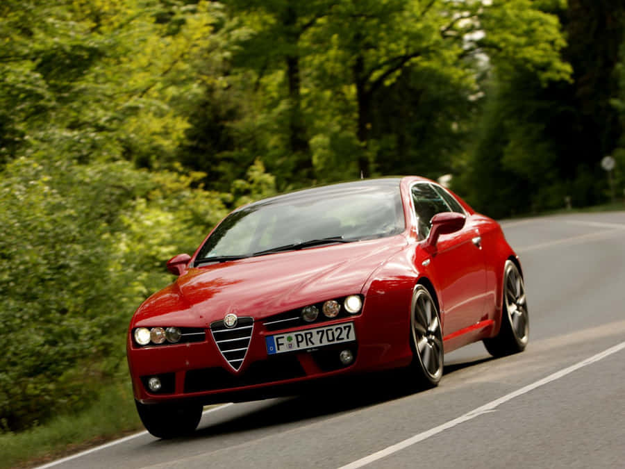 Sleek Alfa Romeo Brera In Urban Setting Wallpaper