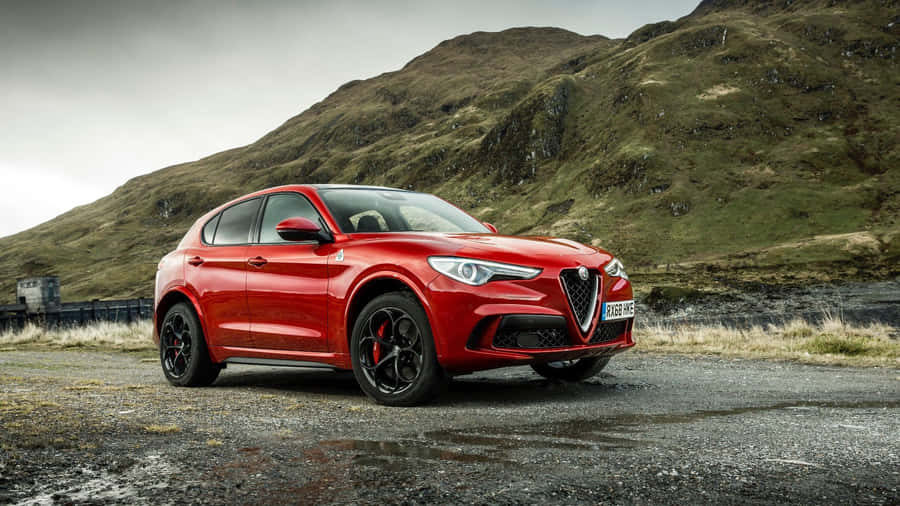 Sleek Alfa Romeo Stelvio In The Wild Wallpaper
