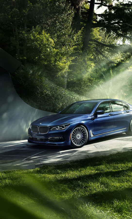 Sleek And Classy Bmw 7 Series In Action Wallpaper