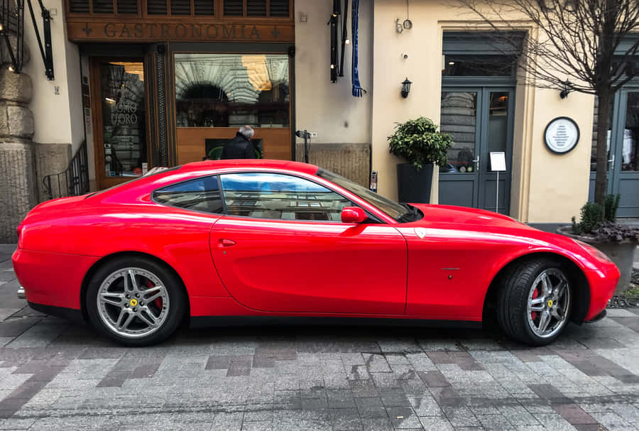 Sleek And Elegant Ferrari 612 Scaglietti In Action Wallpaper