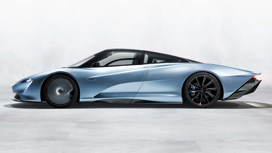 Sleek And Elegant Mclaren Speedtail In Motion Wallpaper