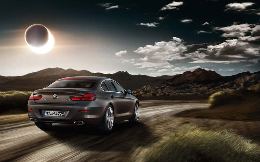 Sleek And Luxurious Bmw 6 Series In Action Wallpaper