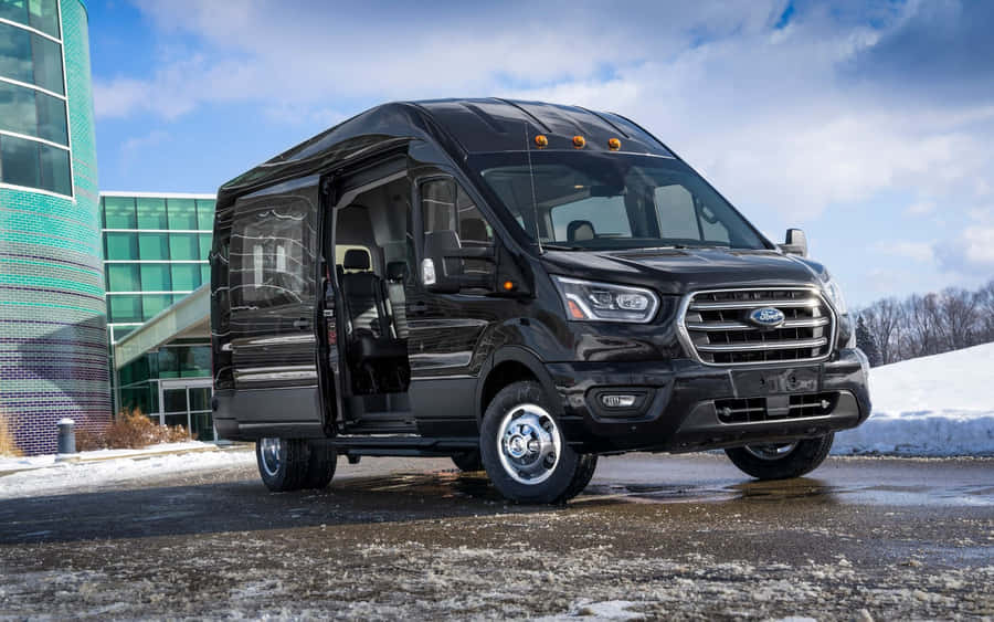 Sleek And Modern Ford Transit On City Street Wallpaper