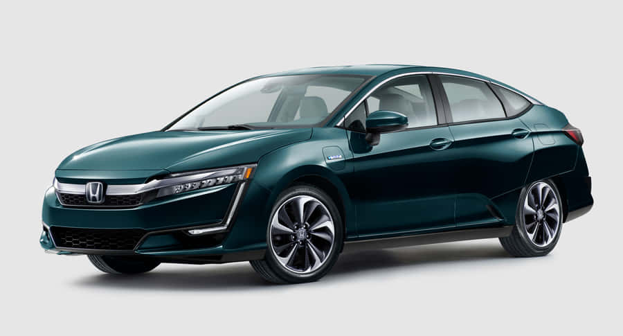 Sleek And Modern Honda Clarity On Scenic Road Wallpaper