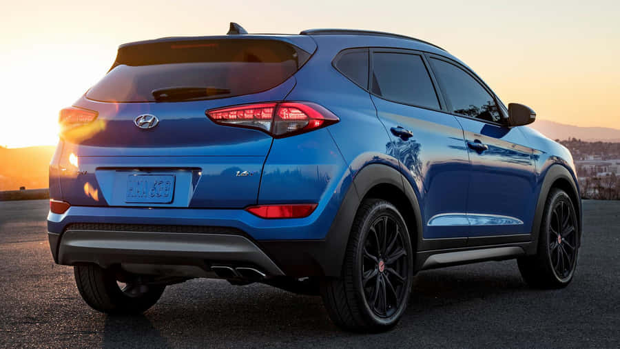 Sleek And Modern Hyundai Tucson On A Scenic Drive Wallpaper