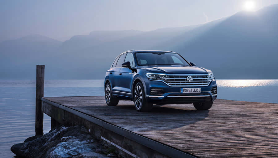 Sleek And Modern Volkswagen Touareg On The Road Wallpaper