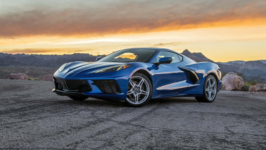 Sleek And Powerful Chevrolet Corvette Stingray In Action Wallpaper