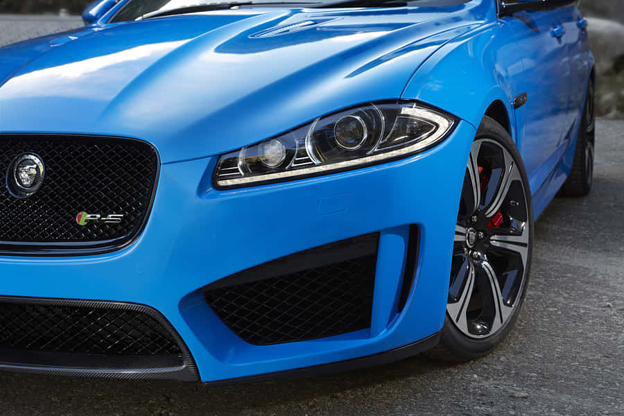 Sleek And Powerful Jaguar Xfr In Action Wallpaper