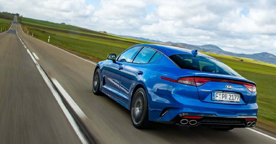 Sleek And Powerful Kia Stinger Sports Sedan Wallpaper