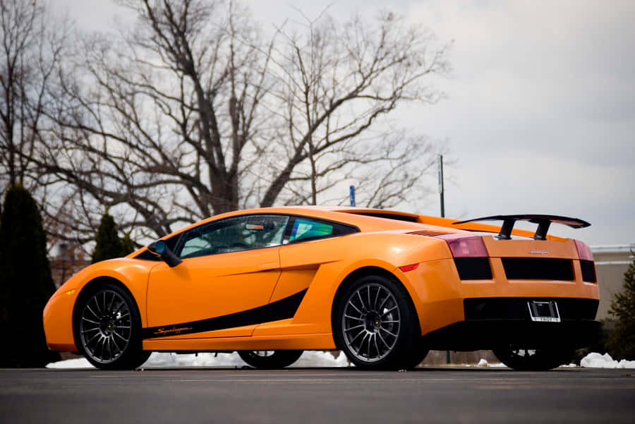 Sleek And Powerful Lamborghini Gallardo On The Road Wallpaper