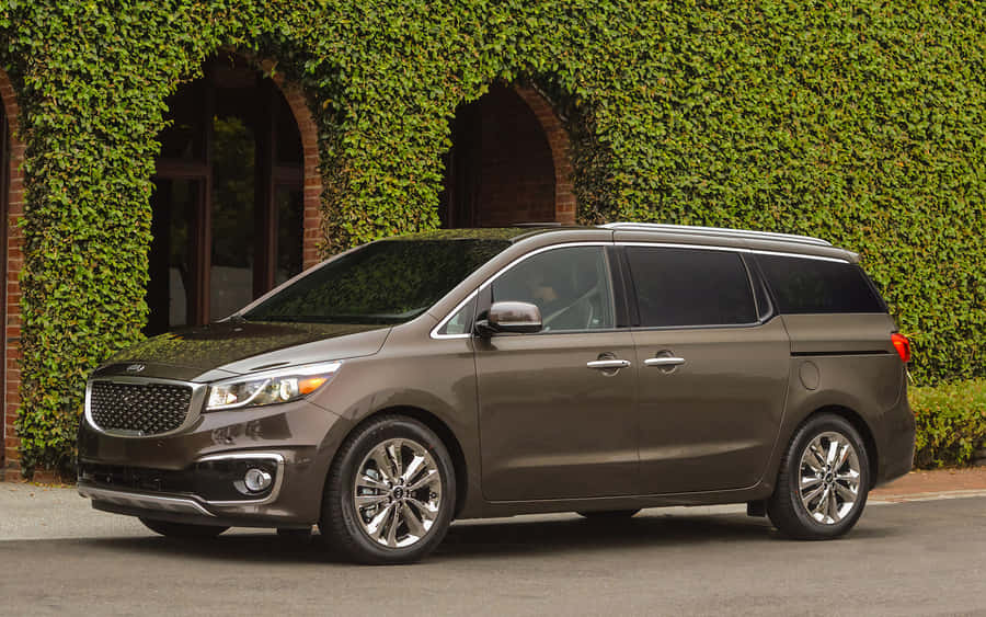 Sleek And Sophisticated Kia Sedona Minivan Wallpaper
