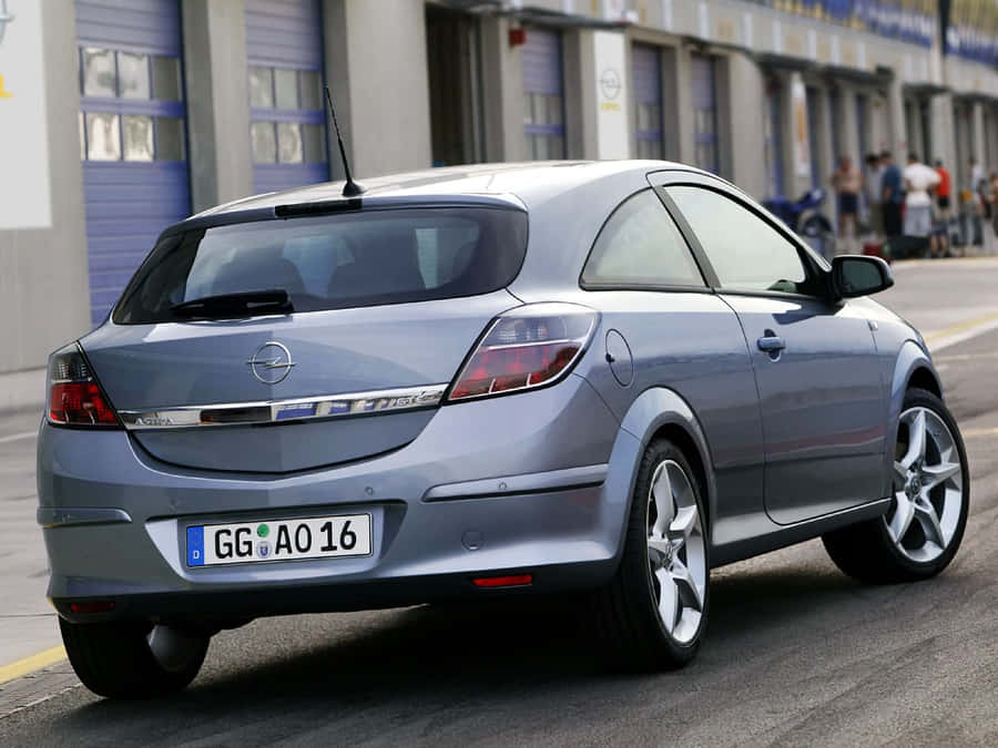 Sleek And Stunning Opel Astra In Action Wallpaper