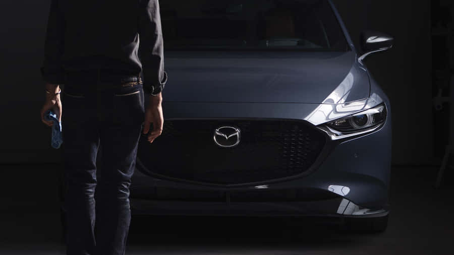 Sleek And Stylish 2020 Mazda 3 Hatchback On The Road Wallpaper