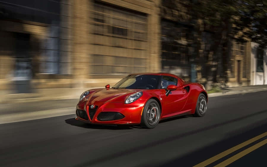 Sleek And Stylish Alfa Romeo 4c On The Road Wallpaper