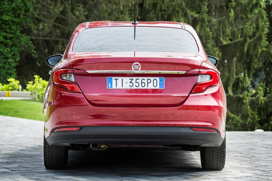 Sleek And Stylish Fiat Tipo On Open Road Wallpaper