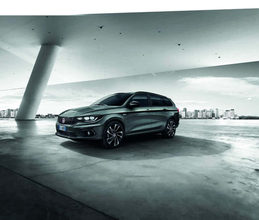 Sleek And Stylish Fiat Tipo On The Road Wallpaper