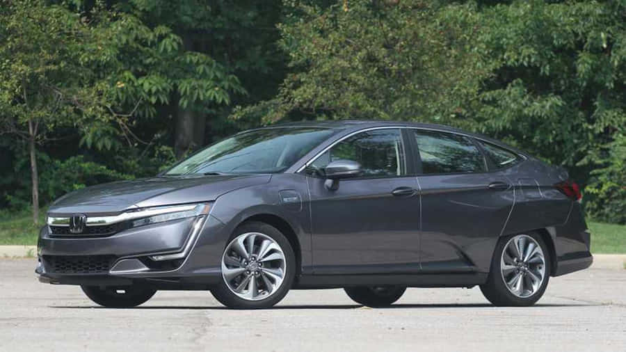 Sleek And Stylish Honda Clarity On The Road Wallpaper