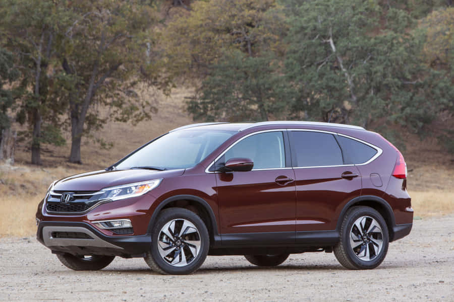 Sleek And Stylish Honda Cr-v On Open Road Wallpaper