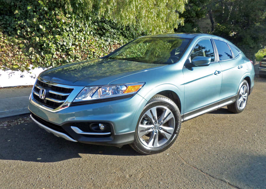 Sleek And Stylish Honda Crosstour On The Road Wallpaper