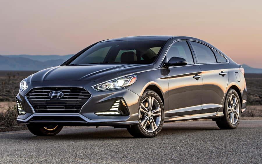 Sleek And Stylish Hyundai Sonata On The Road Wallpaper