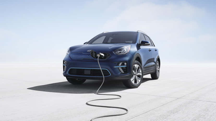Sleek And Stylish Kia Niro On The Road Wallpaper