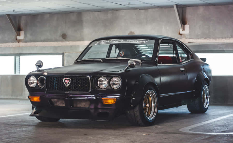 Sleek And Stylish Mazda Rx-3 In High Definition Wallpaper