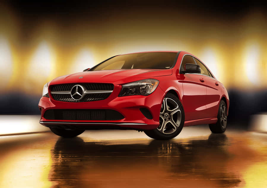 Sleek And Stylish Mercedes Benz Cla-class In Motion Wallpaper