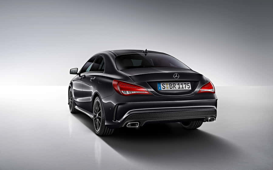 Sleek And Stylish Mercedes-benz Cla-class On The Road Wallpaper