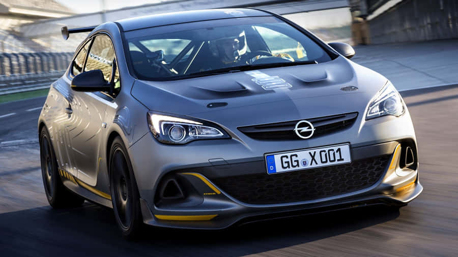 Sleek And Stylish Opel Astra In Motion Wallpaper