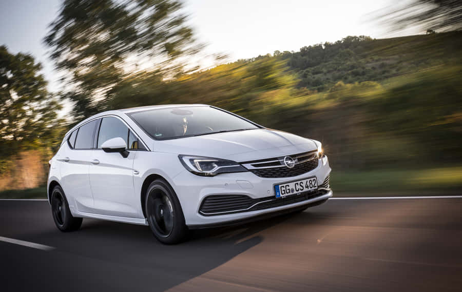 Sleek And Stylish Opel Astra Showcasing Its Modern Design Wallpaper