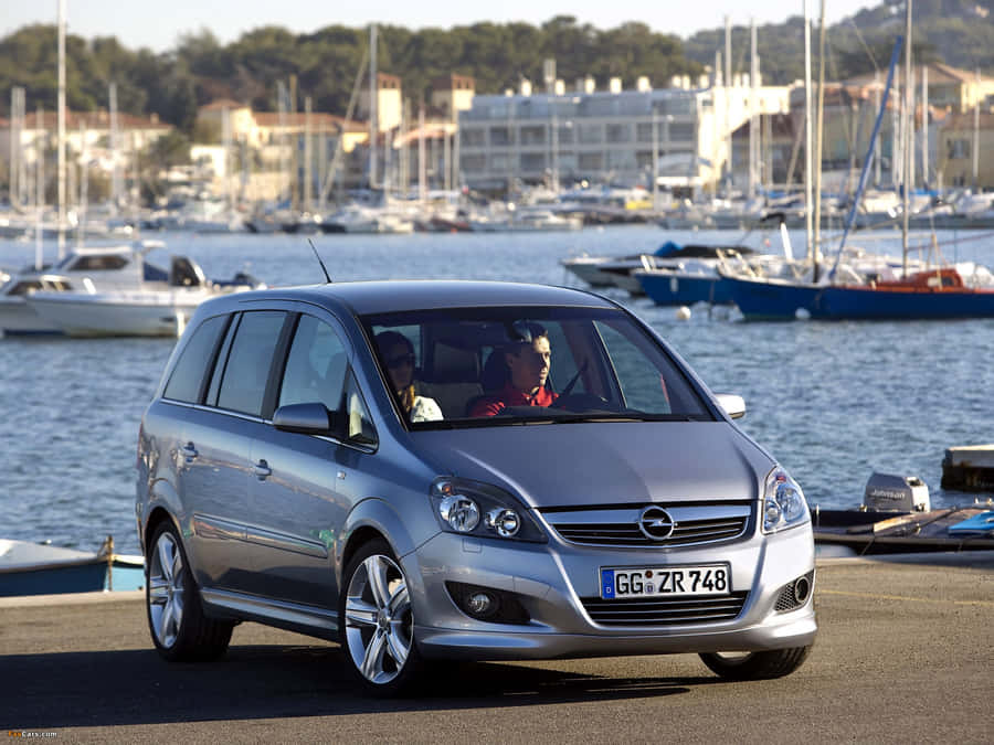 Sleek And Stylish Opel Zafira On The Road Wallpaper