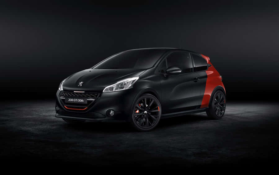 Sleek And Stylish Peugeot 208 In Action Wallpaper