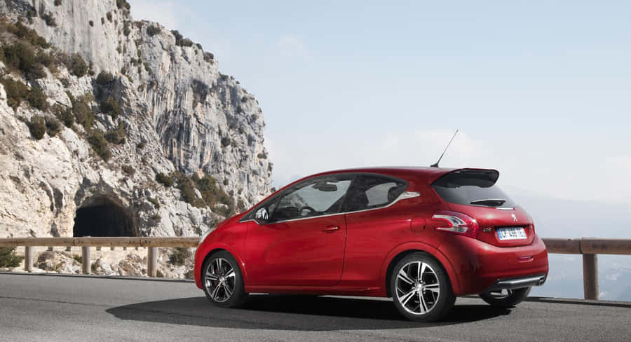 Sleek And Stylish Peugeot 208 In Pristine Condition Wallpaper