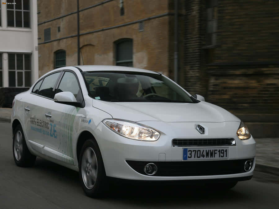 Sleek And Stylish Renault Fluence On The Road Wallpaper