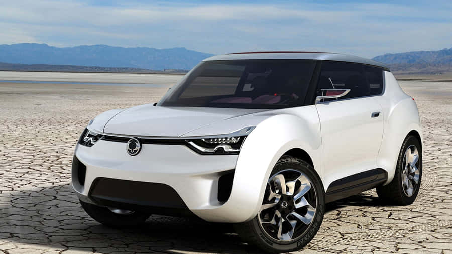 Sleek And Stylish Ssangyong Suv On The Road Wallpaper