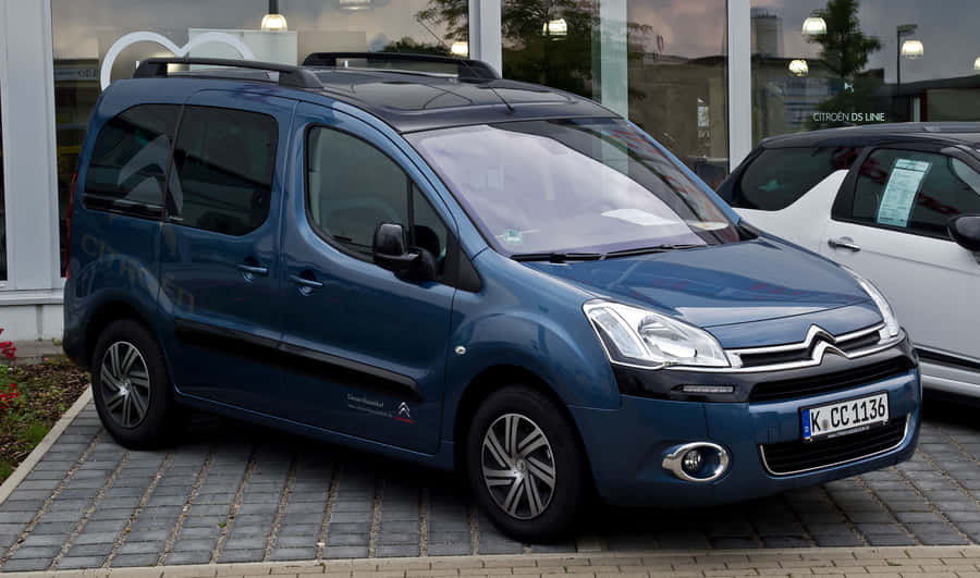 Sleek And Versatile Citroen Berlingo On Road Wallpaper