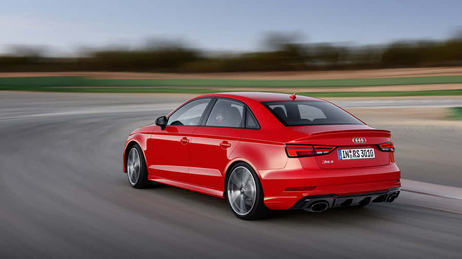 Sleek Audi Rs3 In Motion Wallpaper