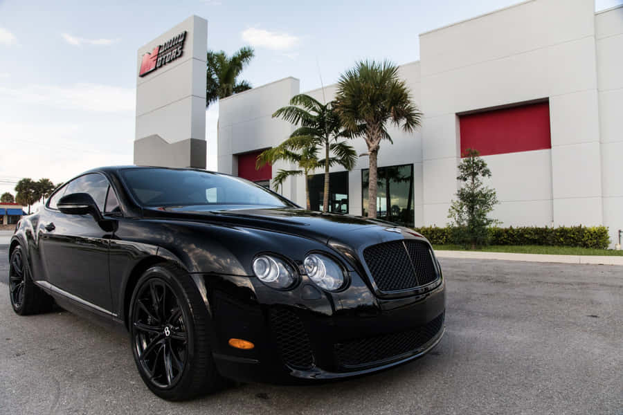 Sleek Bentley Continental Supersports In Action Wallpaper