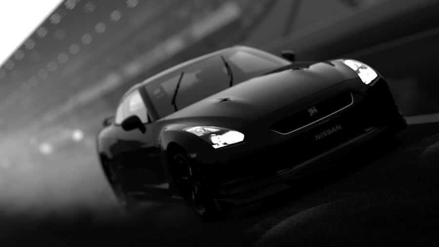 Sleek Black And White Sports Car Wallpaper